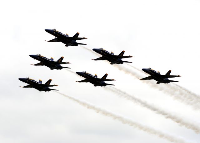 McDonnell Douglas FA-18 Hornet — - The US Navy Blue Angels fly by the crowd for the last time of the preformance in the "Delta" formation before going to land at the nearby Quad City Airport at the 2011 Quad City Airshow