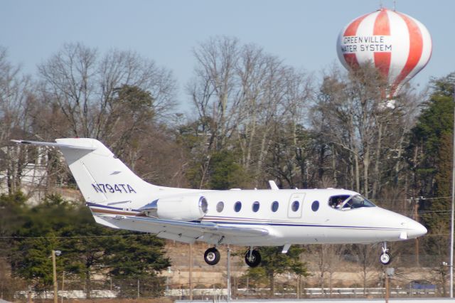 Beechcraft Beechjet (N794TA) - Beech Biz-Jet is welcomed to Greenville by the Hot-Air Baloon water tower adjacent to KGMU