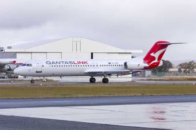 Fokker 100 (VH-NHP) - Network Aviation (VH-NHP) Fokker 100, in new Qantaslink "new roo" livery, taxiing at Wagga Wagga Airport.