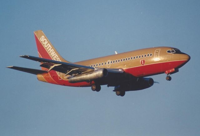 Boeing 737-200 (N80SW) - scanned from aprint. landing 23-R