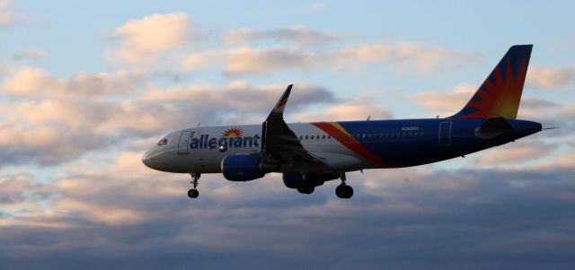 Airbus A320 (N255NV) - Early evening short final for this 2017 Allegiant Airbus 320-214 in the Winter of 2023.