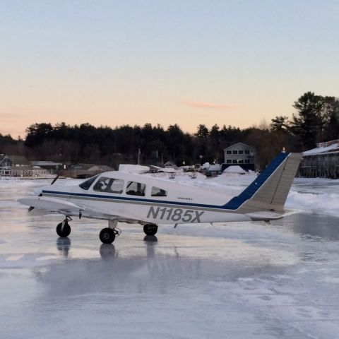 Piper Cherokee (N1185X) - Park on Alton Bay ice runway.