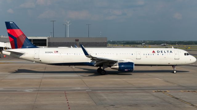 Airbus A321 (N338DN) - Delta Airlines gorgeous A321 taxing out for Fort Myers on July 28th about the time the sun started setting into the horizon. 