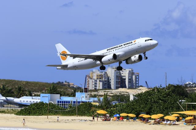 Airbus A320 (HI968) - Dominican airlines departing St Maarten.