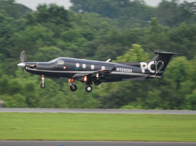 Pilatus PC-12 (SKQ33) - LABCORP 33 "Skylab" departing runway 2 at KJQF - 7/17/13