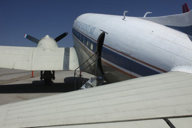 Douglas DC-3 (N760) - Formerly operated by TWA, aircraft sits on South side of KLAX at The FLIGHTPATH LEARNING CENTER & MUSEUM. Tail of Qantas A380 (VH-OQH), can be seen far right.