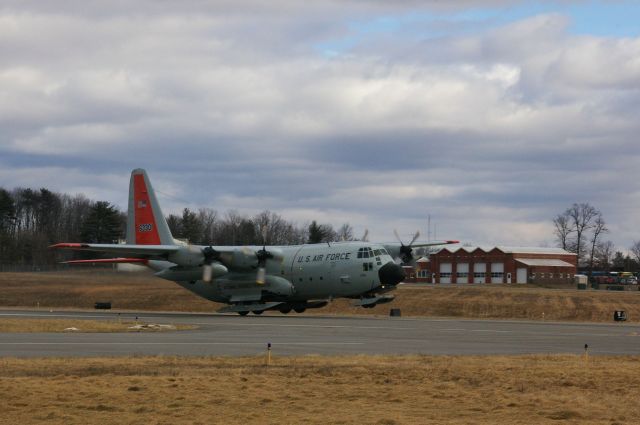 N63301 — - LC-130 landing at KSCH RW22 on 2/4/12. Shot from N675A on taxiway A.