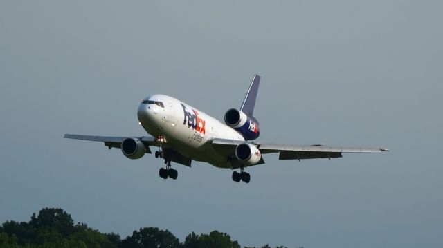 McDonnell Douglas DC-10 — - Here we have a beautiful FedEx McDonnell-Douglas MD-10-10F, landing on runway four. Took this from my new planespotting location! What do you think?