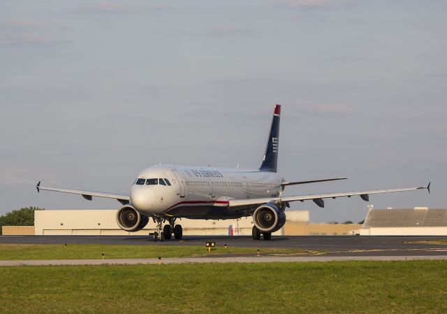 Airbus A321 (N184US) - This Airbus A321 has just landed and is turning on to the taxiway from runway 36R, Charlotte, North Carolina USA