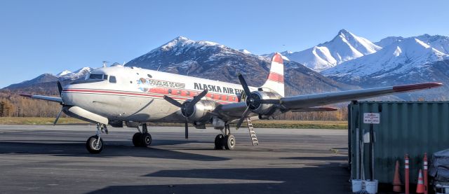 Douglas C-54 Skymaster (N96358) - Alaska Air Fuel terminal, Palmer Municipal Airport, AK