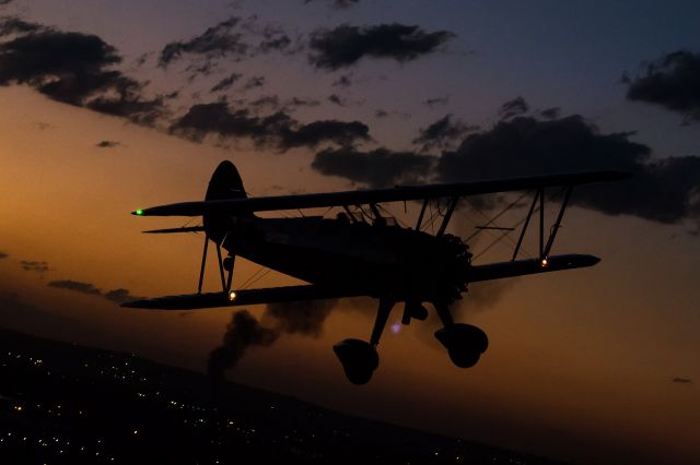 ZU-IES — - Boeing Stearman silhouette against the Johannesburg sunset during a night photo shoot at the airfield