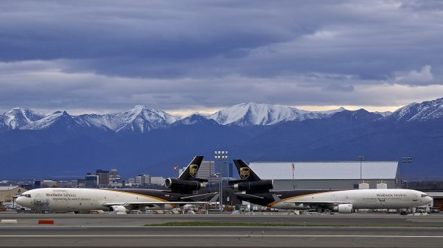 Boeing MD-11 (N259UP) - Shot from the West Access Road at the approach end of RWY 15; Ted Stevens Anchorage International Airport; Anchorage, Alaska, USA