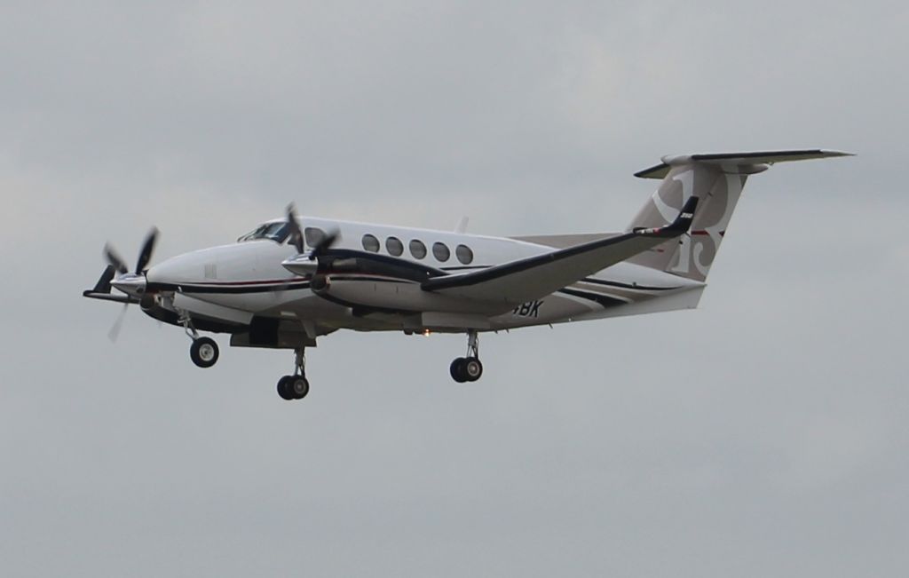 Beechcraft Super King Air 200 (N204BK) - A Beechcraft B250GT departing Runway 27 at Jack Edwards National Airport, Gulf Shores, AL - June 30, 2017. Shot from the Platinum Air Center ramp.