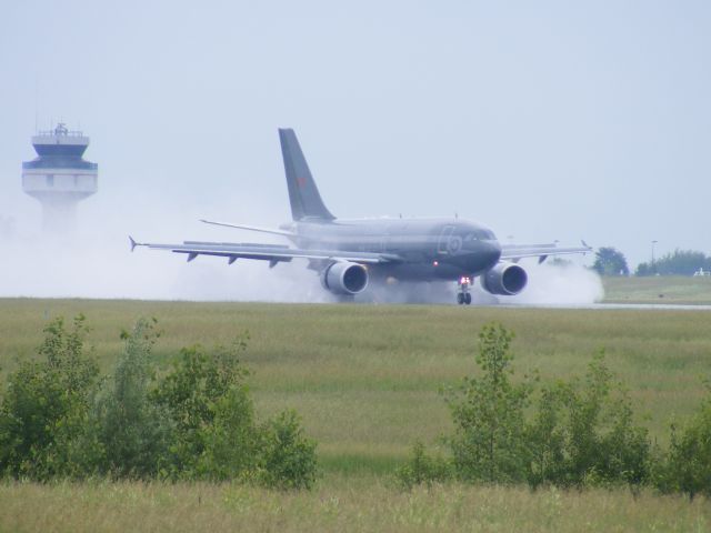 Airbus A310 (C15003) - cc-150 landing just after a down pour.