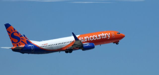 Boeing 737-800 (N830SY) - Shortly after departure is this 2001 Sun Country Airlines Boeing 737-83N in the Summer of 2022.