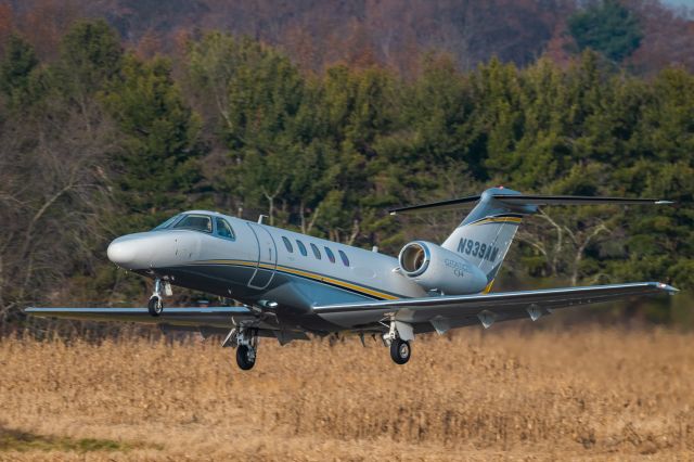 Cessna Citation CJ4 (N939AM) - Cessna Citation CJ4, N939AM taking of from KLOM (Wings Field) on a late autumn afternoon.