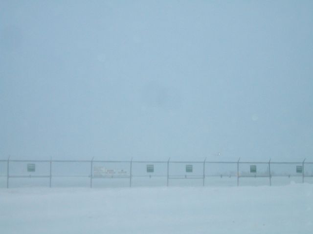 C-FUCF — - Tassili Airlines Dash 8 just about to land at Goose Airport NL. Visability  very low.
