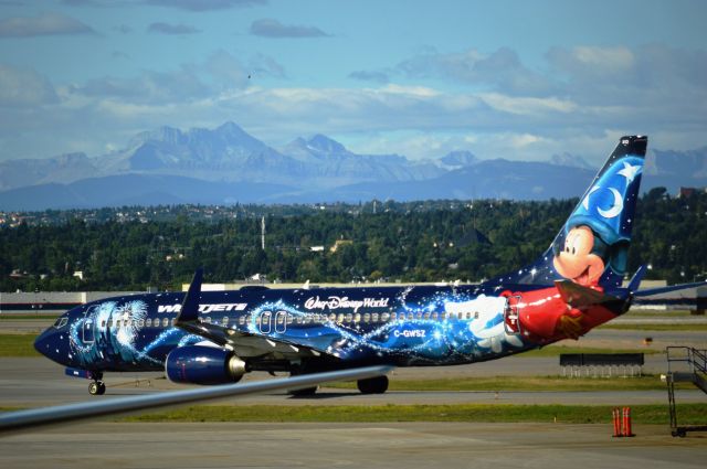 Boeing 737-700 — - off Calgary to see Mickey.