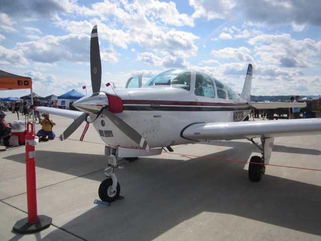 Beechcraft Bonanza (33) (N8289N) - Sitting pretty at the Thunder Over New Hampshire Airshow.