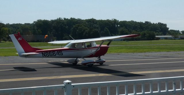 Cessna Commuter (N8664S) - Taxiing for departure is this 1965 Cessna 150F Communter in the Summer of 2023.