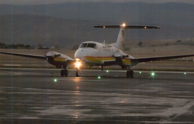 Beechcraft Super King Air 200 (VH-LTQ) - Beechcraft Kingair B200C VH-LTQ Serial number BL170.br /Aircraft returns to base on cold wet afternoon.