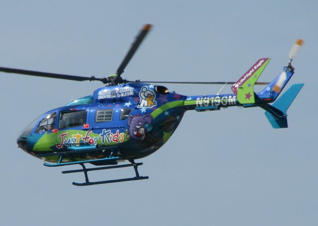 KAWASAKI EC-145 (N919CM) - Departing Downtown Shreveport. A colorful kid friendly aircraft!