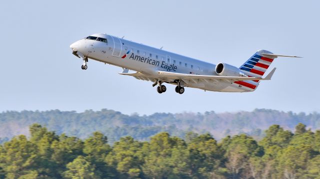 Canadair Regional Jet CRJ-200 (N228PS) - PSA Airlines (American Eagle) Bombardier CRJ200 (N228PS) departs KRDU Rwy 23R on 2/11/2017 at 4:06 pm.