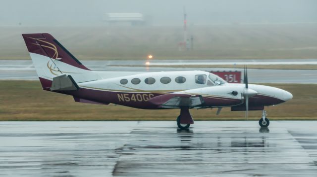 Cessna Conquest 1 (N540GC) - A Cessna 425 taxis at EFD on a rainy 12/15/2020