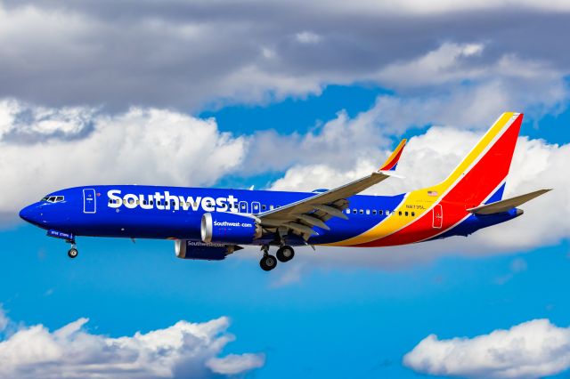 Boeing 737 MAX 8 (N8735L) - A Southwest Airlines 737 MAX 8 landing at PHX on 2/28/23. Taken with a Canon R7 and Canon EF 100-400 L ii.