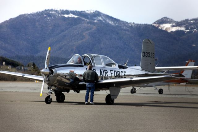 North American Navion — - Prep for flight, No real idea what their plans were.  Any bird honoring the military catches my eye. Believe this to be an older restored training aircraft. "N" number unavailable .. Tail showing  # 33393