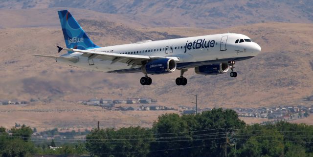 Airbus A320 (N794JB) - The debut visit to Reno of jetBlue's LGBTQ Tribute aircraft, "Shantay, Blue Stay," featuring the new "Spotlight" tail design, is clicked here as N794JB is on very s/final to Runway 16R yesterday. Unveiled only two months ago, "Shantay, Blue Stay" is JBU's way of recognizing and honoring the LGBTQ community.br /There is an article on the web.  For the convenience of those who may wish to read it, copy and paste the link below ..... br /br /https://finance.yahoo.com/news/jetblue-rupaul-drag-race-bring-224600960.html