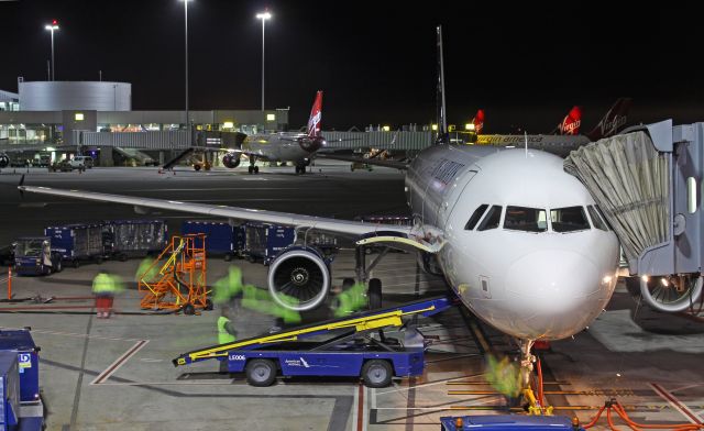 Airbus A321 (N174US) - An ex-US Airways A321 being loaded up for PHX