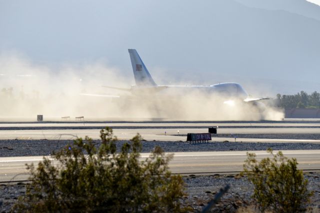 Boeing 747-200 (N29000) - Lots of dust stirred up after landing.