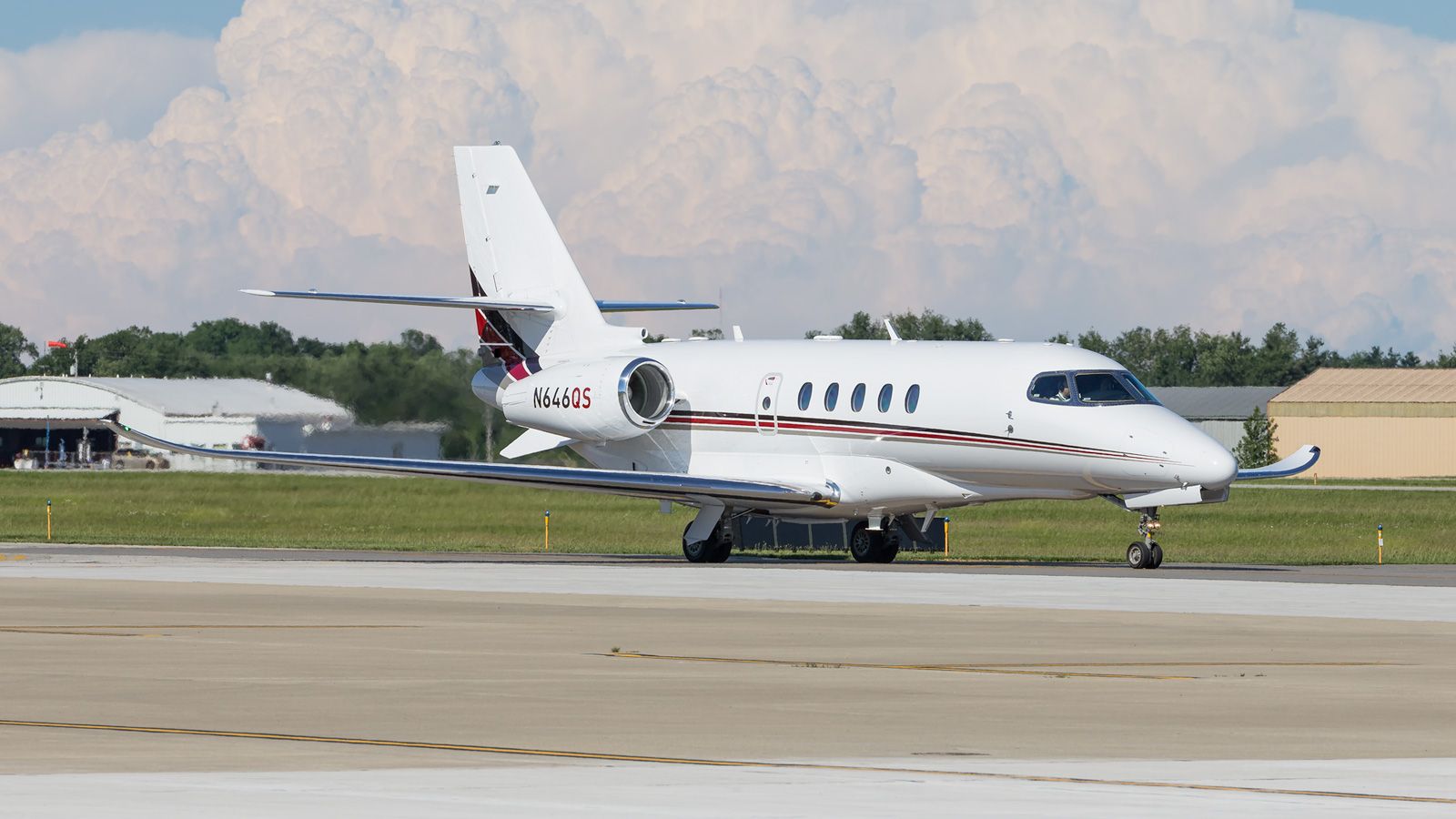 Cessna Citation Excel/XLS (N646QS) - A Netjets Cessna 560XL Citation Excel taxi's up to the parking area at KPPO.