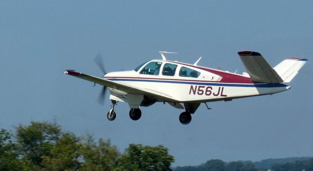 Beechcraft Bonanza (33) (N56JL) - Shortly after departure is this 1977 Beechcraft V35 Bonanza in the Summer of 2023.