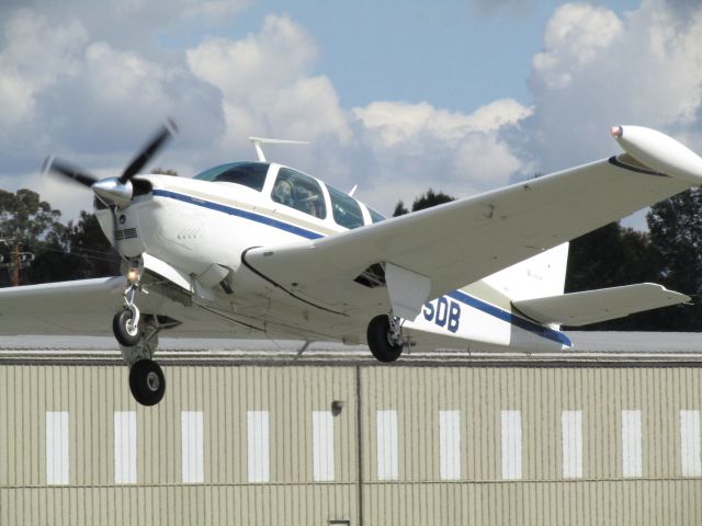 Beechcraft Bonanza (33) (N555DB) - Taking off RWY 24