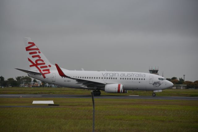 Boeing 737-700 (VH-NBV) - VH-NBV departing YBMK on a rainy afternoon as VA610