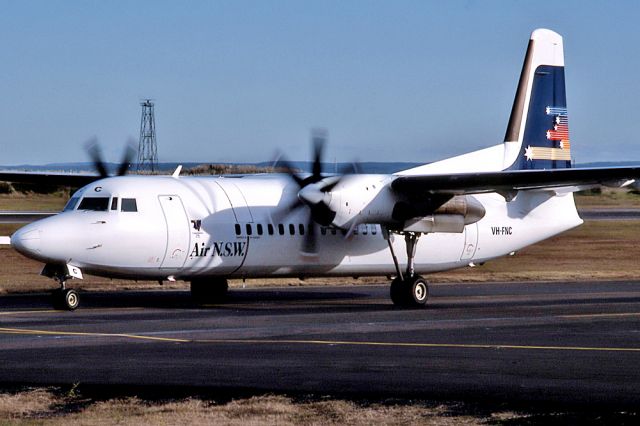 Fokker 100 (VH-FNC) - AIR NSW - FOKKER F-50 - REG : VH-FNC (CN 20108) - KINGSFORD SMITH SYDNEY NSW. AUSTRALIA - YSSY 28/6/1988 35MM SLIDE CONVERSION USING A LIGHTBOX AND A NIKON L810 DIGITAL CAMERA IN THE MACRO MODE.