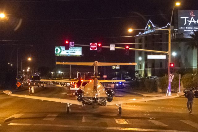 Eclipse 500 (N656FP) - An Eclipse EA500 being moved from the Las Vegas Convention Center back to McCarran International Airport after the NBAA13 static display ended.