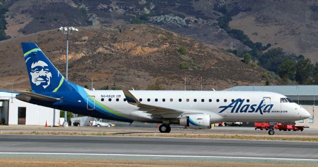 Embraer 175 (N648QX) - Taxiing to the gate at straight-up high noon after arriving from Seattle (KSEA) and landing on Runway 29-11.