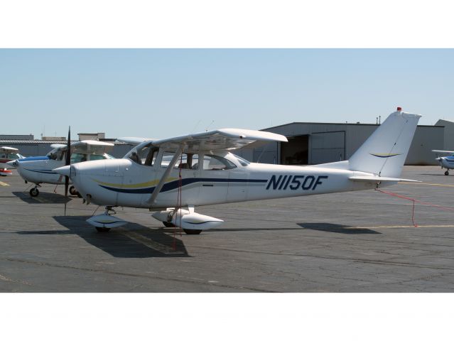 Cessna Skyhawk (N1150F) - An older Cessna 172 with a 6 - cylinder engine. note the dual exhausts. Very nice paint job, looks very good.