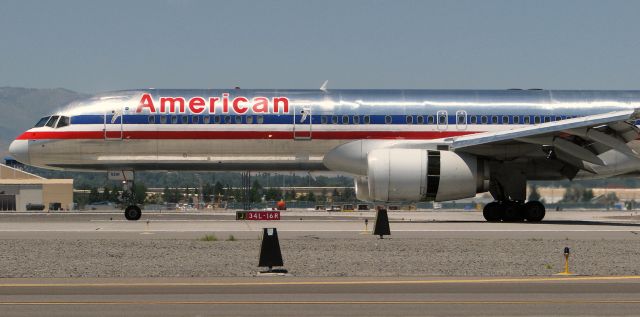 Boeing 757-200 — - Reversing thrust as it races right past my spotting poosition after landing on RTIAs runway 16L.