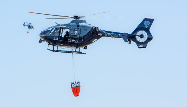 Eurocopter EC-635 (N823JM) - MSP water bucket drills at Plymouth