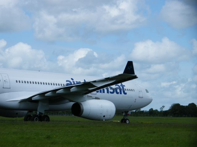 Airbus A330-300 (C-GTSO) - C-GTSO A330 TAXING FOR DEP AS TSC 232 ON 02-06-2011