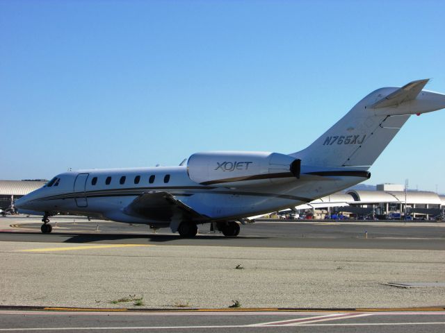 Cessna Citation X (N765XJ) - Holding short RWY 20R