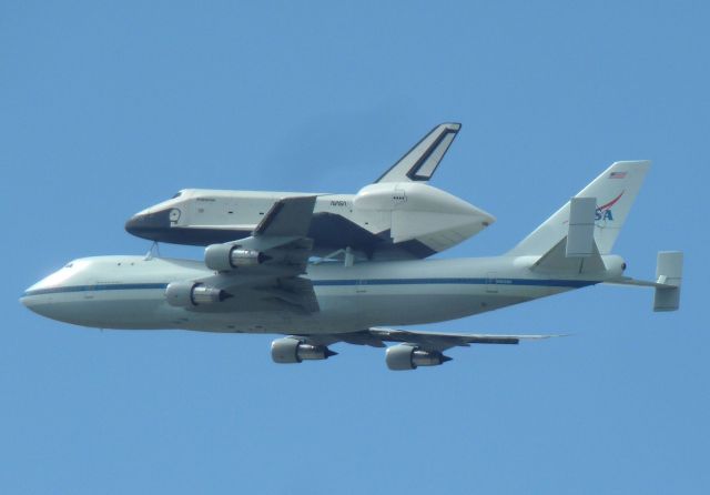 BOEING 747-100 (N905NA) - Space Shuttle Enterprise and Nasa 747-123 Shuttle Transport N905NA doing and low altitude fly-by of Runway 13 at KLGA on April 27, 2012.