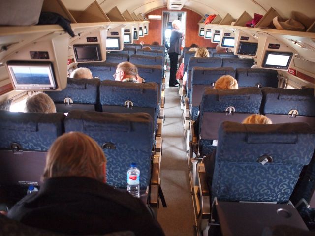 Douglas DC-3 (VH-TMQ) - 1940's style aircraft comfort. Plenty of room - maximum passengers 28. Cruising the Australian Outback - Coober Pedy to Alice Springs - June 2013.