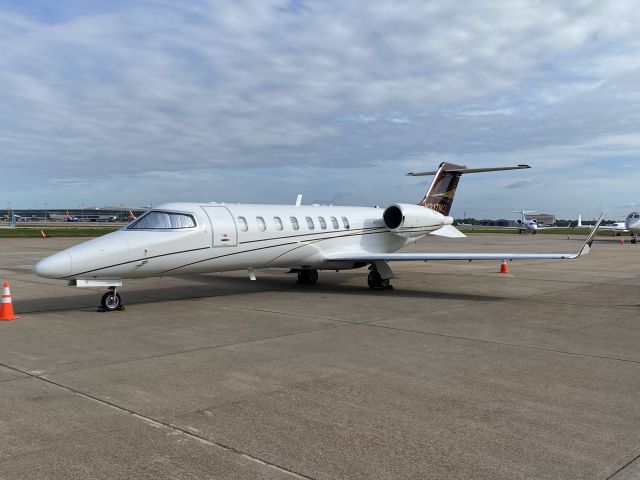 Learjet 45 (N317MC) - N317MC at Signature Flight Support KHOU