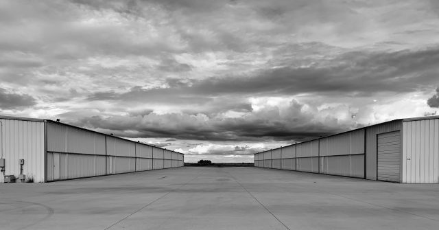 — — - Henriksen Jet Center T-Hangars, Austin Executive Airport