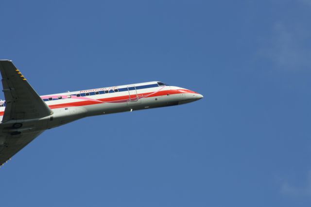 Embraer ERJ-145 (N909AE) - One of American Eagles Susan G. Komen liveries taking off from KMLU.